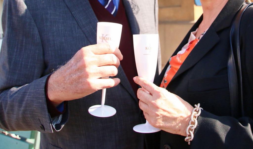 Jerry Moss and a friend enjoying champagne after Gormley won the Santa Anita Derby. (Julie June Stewart photo)